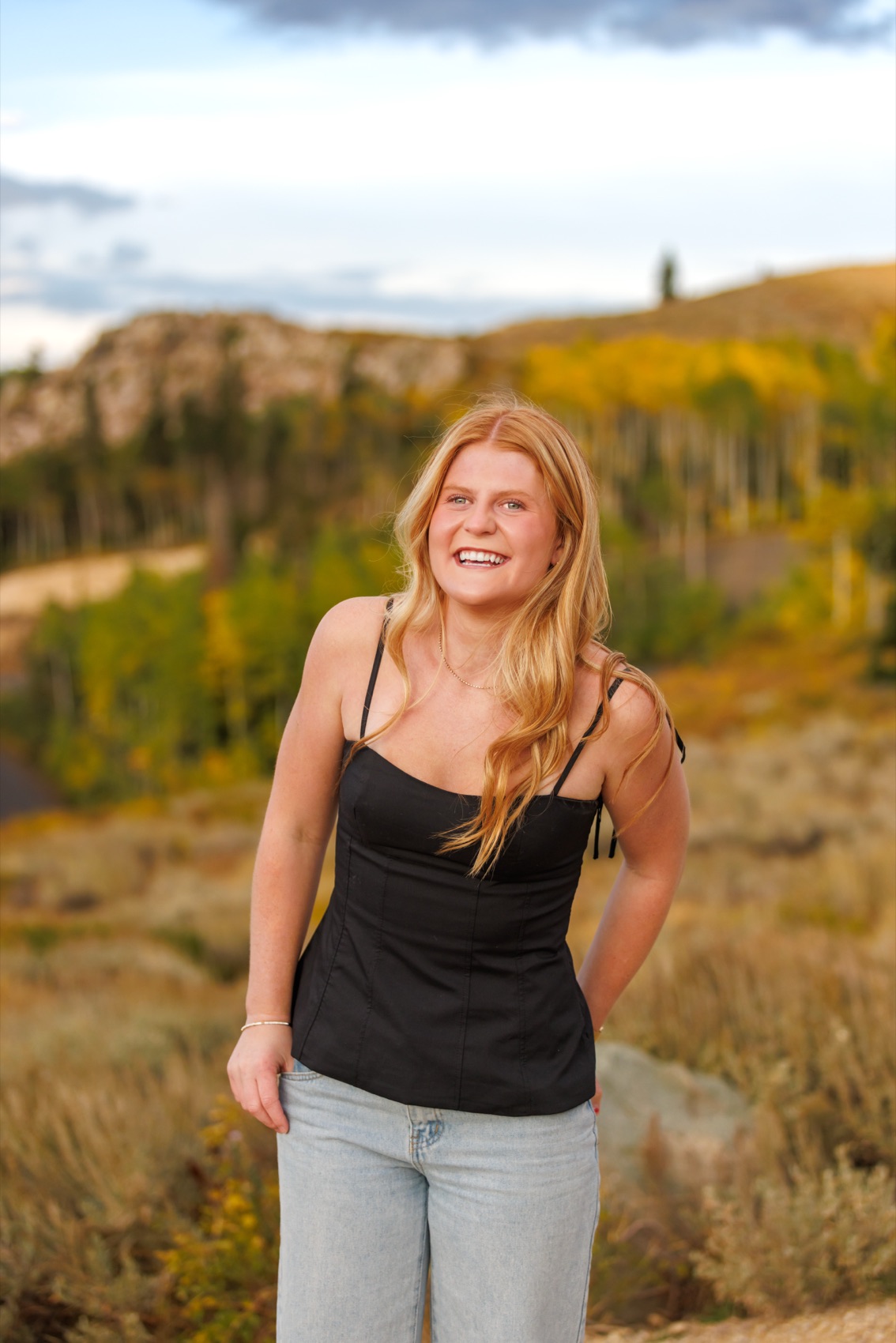 A senior portrait photographed outdoors in Utah