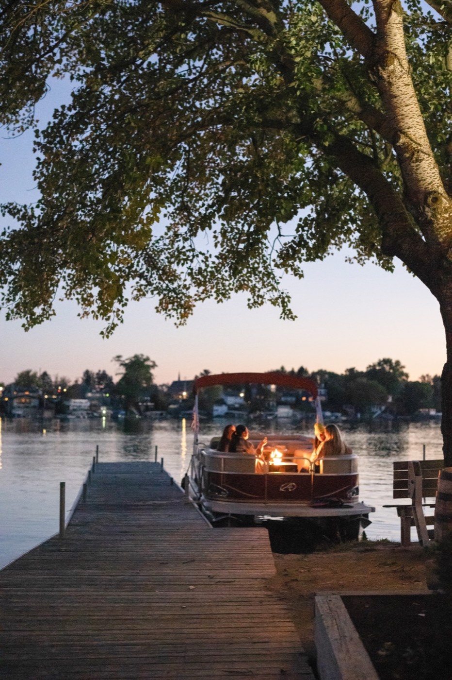 Guests on the water at sunset