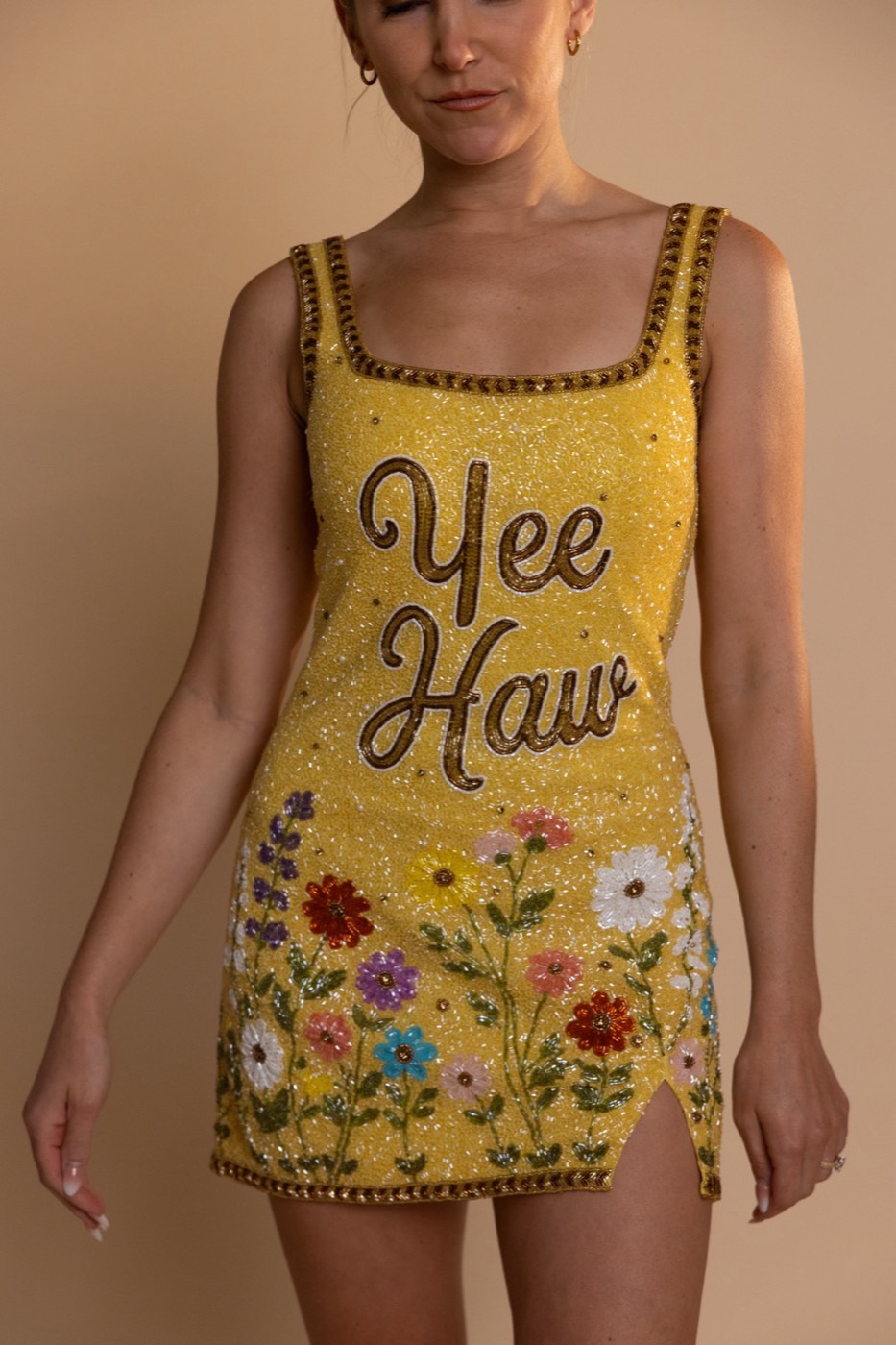 A hand-beaded dress photographed in the studio